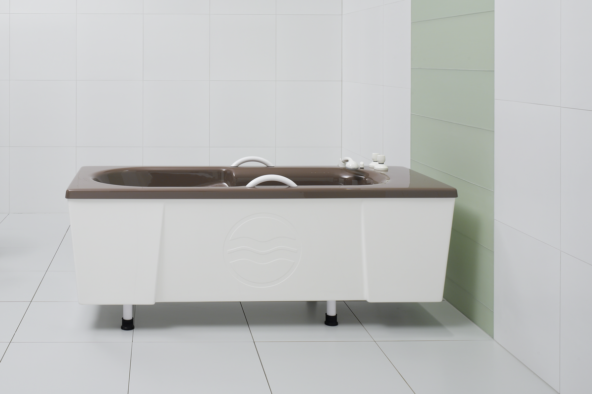 A brown tub with white cladding for moor-mud baths