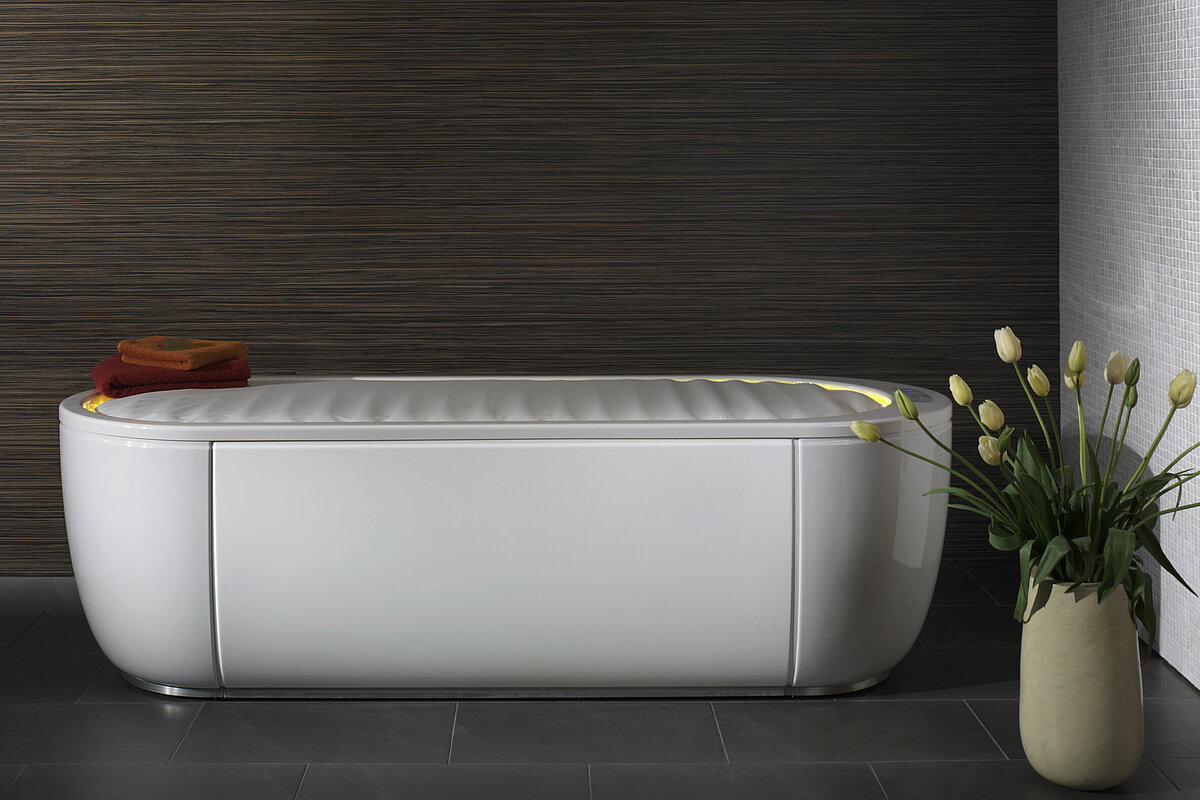 An elegant bed for body wraps in the professional spa area. 